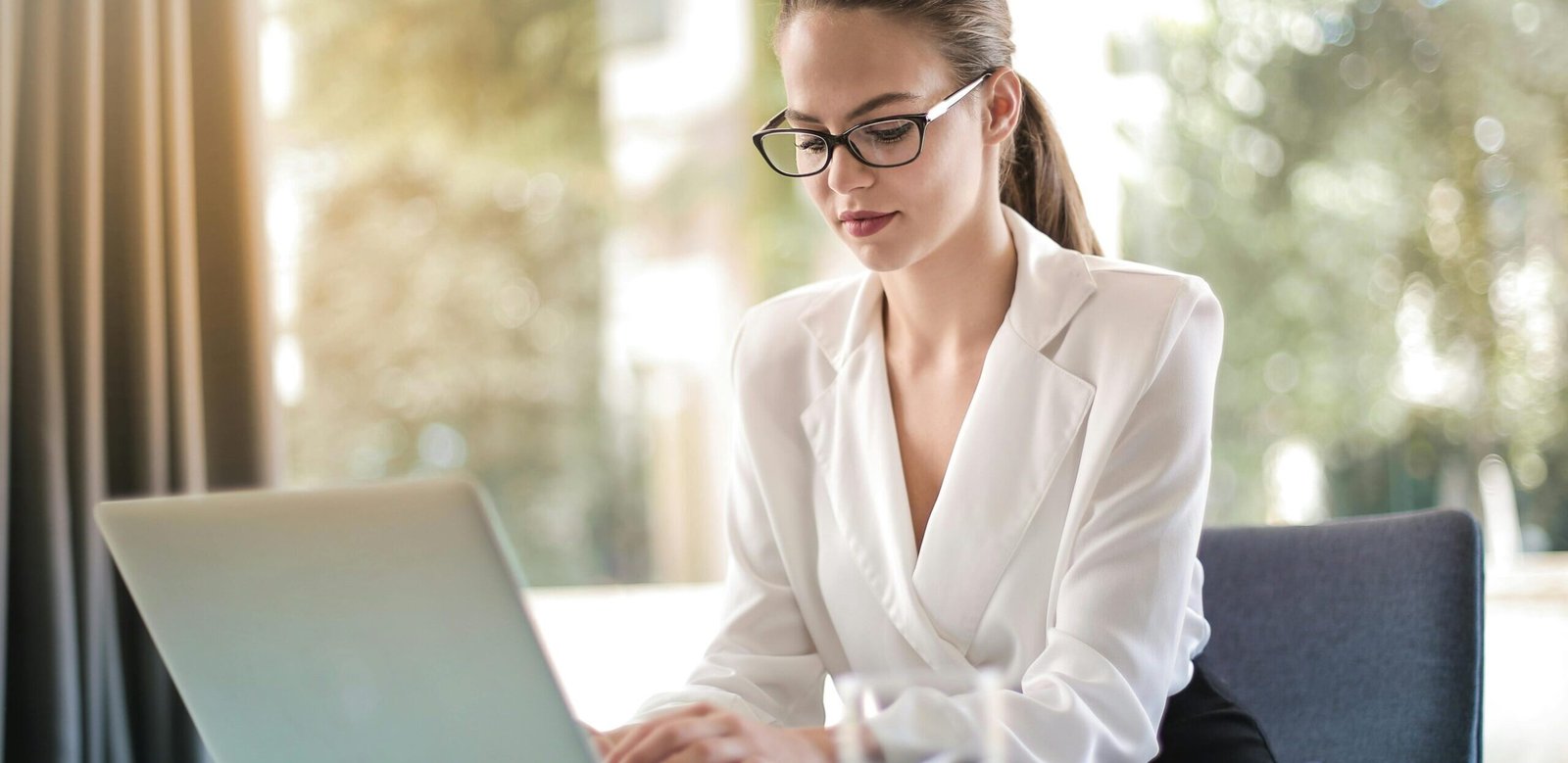 female business woman using her laptop