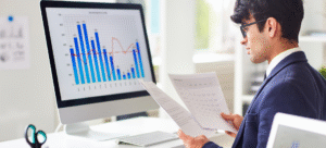 Business owner comparing asset finance and business loans