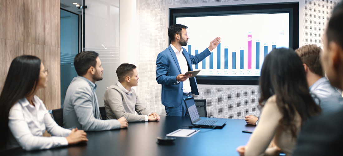 Lender reviewing SME business loan application documents and financial data